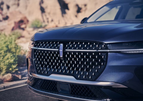 The stylish grille of a 2024 Lincoln Nautilus® SUV sparkles in the sunlight. | Nick Mayer Lincoln Mayfield in Mayfield Heights OH