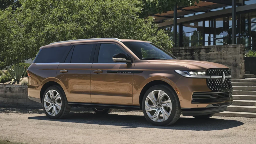 2024 Lincoln Navigator® SUV in bronze finish with chrome trim and black grille, side view