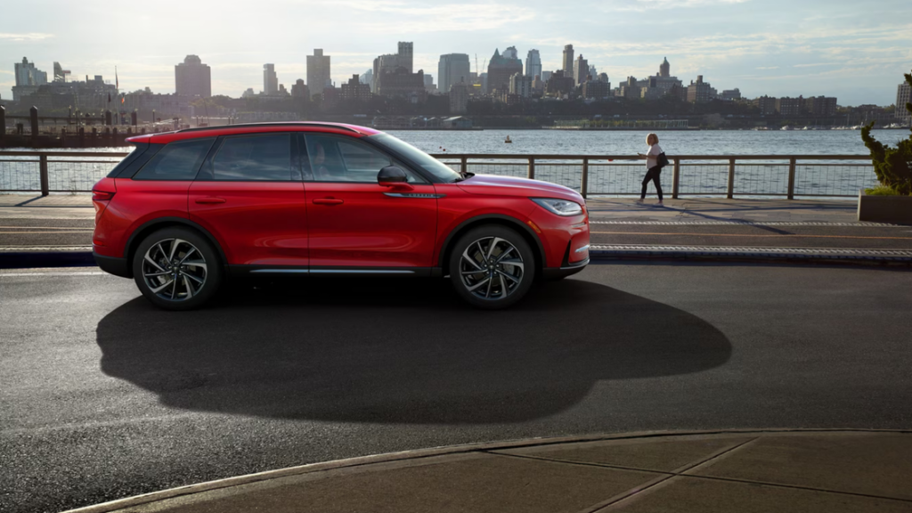 2025 Corsair® Reserve compact luxury SUV in white with bold profile and smooth aerodynamic lines.