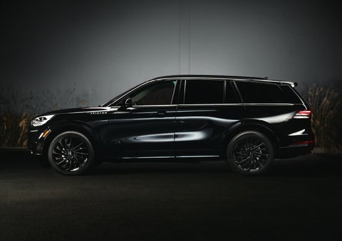 A 2024 Lincoln Aviator® SUV is shown in the Infinite Black exterior color | Nick Mayer Lincoln Mayfield in Mayfield Heights OH