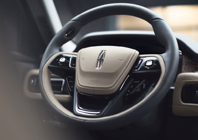 The intuitively placed controls of the steering wheel on a 2024 Lincoln Aviator® SUV | Nick Mayer Lincoln Mayfield in Mayfield Heights OH