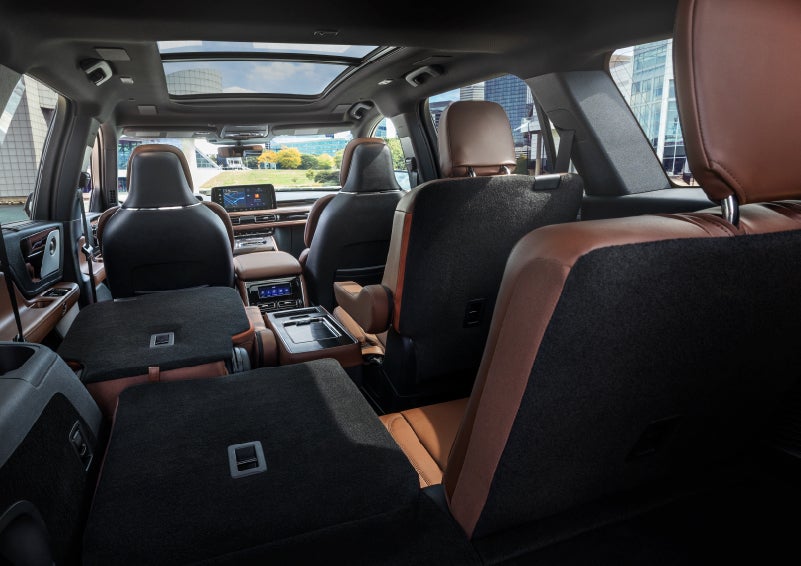 The interior of the 2025 Lincoln Aviator® SUV is shown with two seats folded down for added space. | Nick Mayer Lincoln Mayfield in Mayfield Heights OH