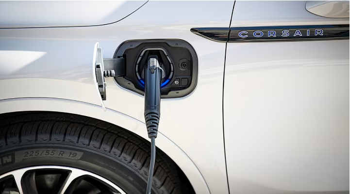 An electric charger is shown plugged into the charging port of a Lincoln Corsair® Grand Touring
model. | Nick Mayer Lincoln Mayfield in Mayfield Heights OH