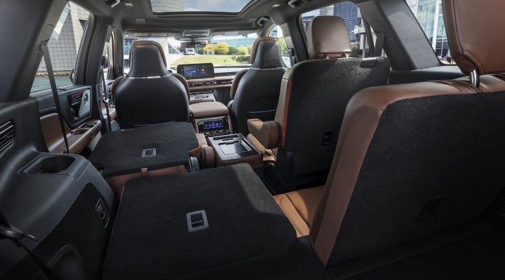 One side of the PowerFold® third-row seat and a second-row seat are folded forward in the 2026 Lincoln Aviator® SUV. | Nick Mayer Lincoln Mayfield in Mayfield Heights OH