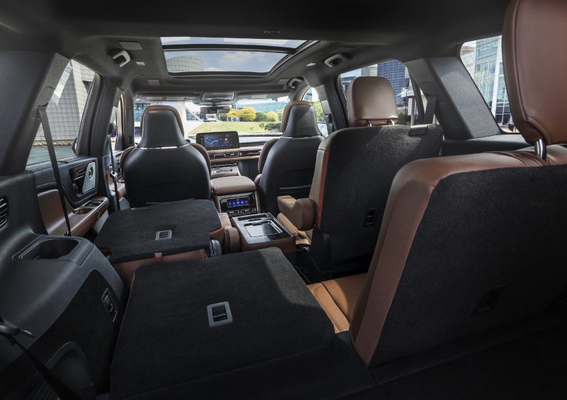 One side of the PowerFold® third-row seat and a second-row seat are folded forward in the 2026 Lincoln Aviator® SUV. | Nick Mayer Lincoln Mayfield in Mayfield Heights OH