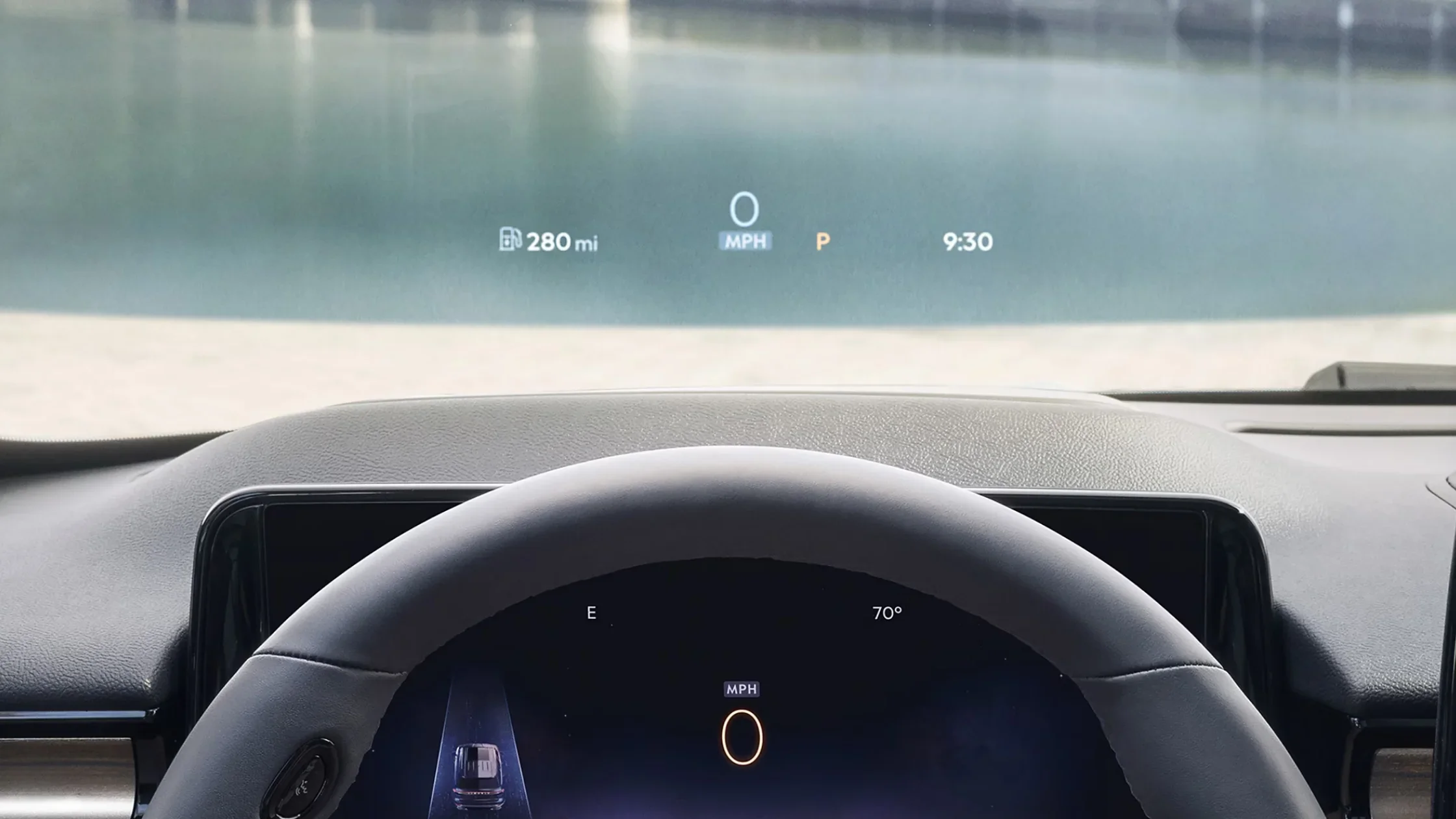 Driver’s perspective of the 2025 Lincoln Aviator® Reserve interior showing a digital head-up display with speed, fuel range, and temperature.