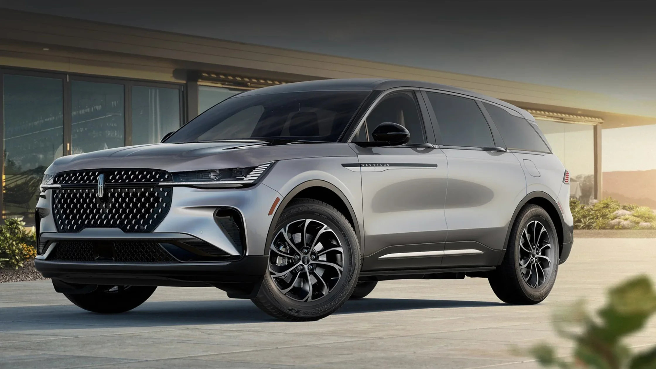 Front view of a 2025 Lincoln Black Label Nautilus® in motion, highlighting its distinctive Lincoln grille, sharp LED headlights, and modern styling.