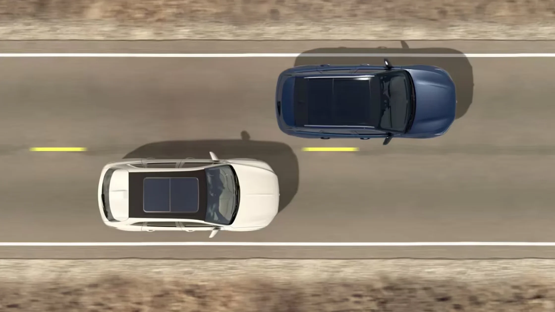 Aerial view of two 2025 Lincoln Aviator® SUVs showing top-mounted panoramic sunroofs on-road