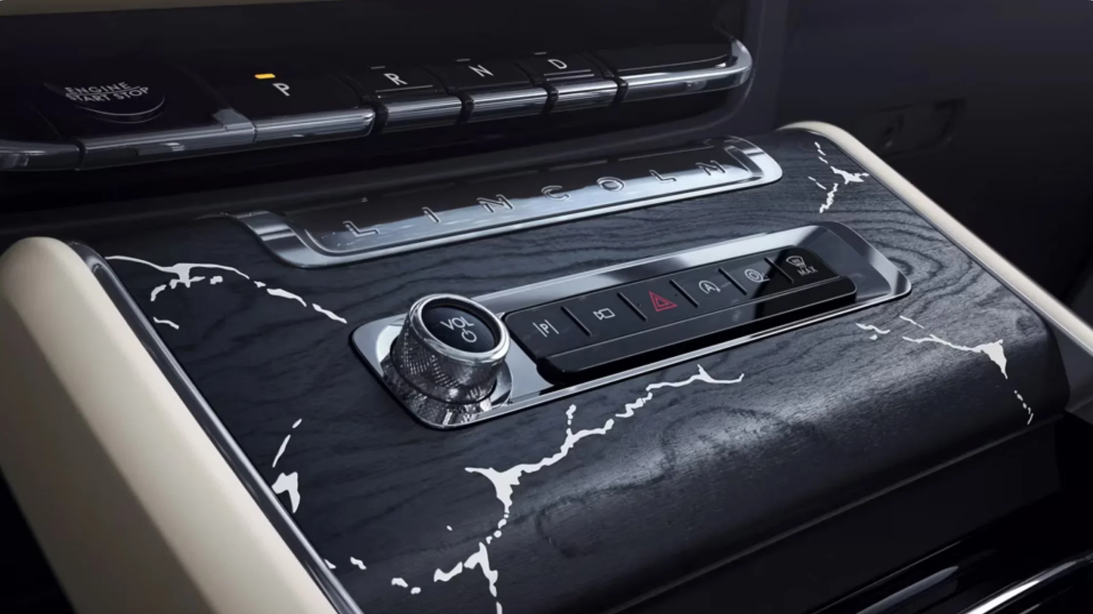 2025 Black Label Aviator interior with premium wood trim and center console controls in detail.