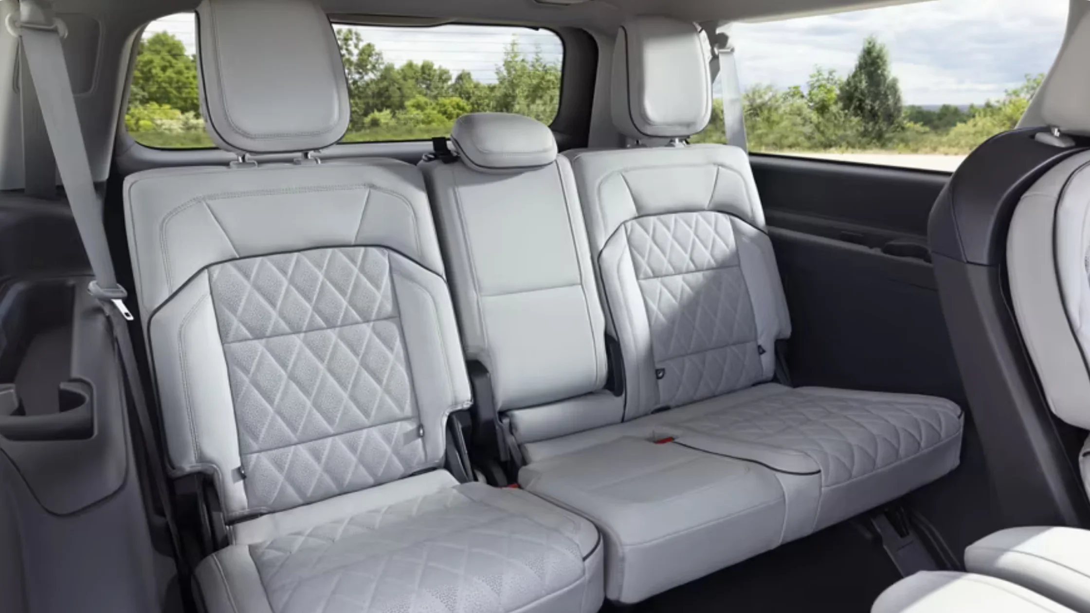 2025 Navigator Reserve third-row seats in quilted leather with spacious passenger accommodations.