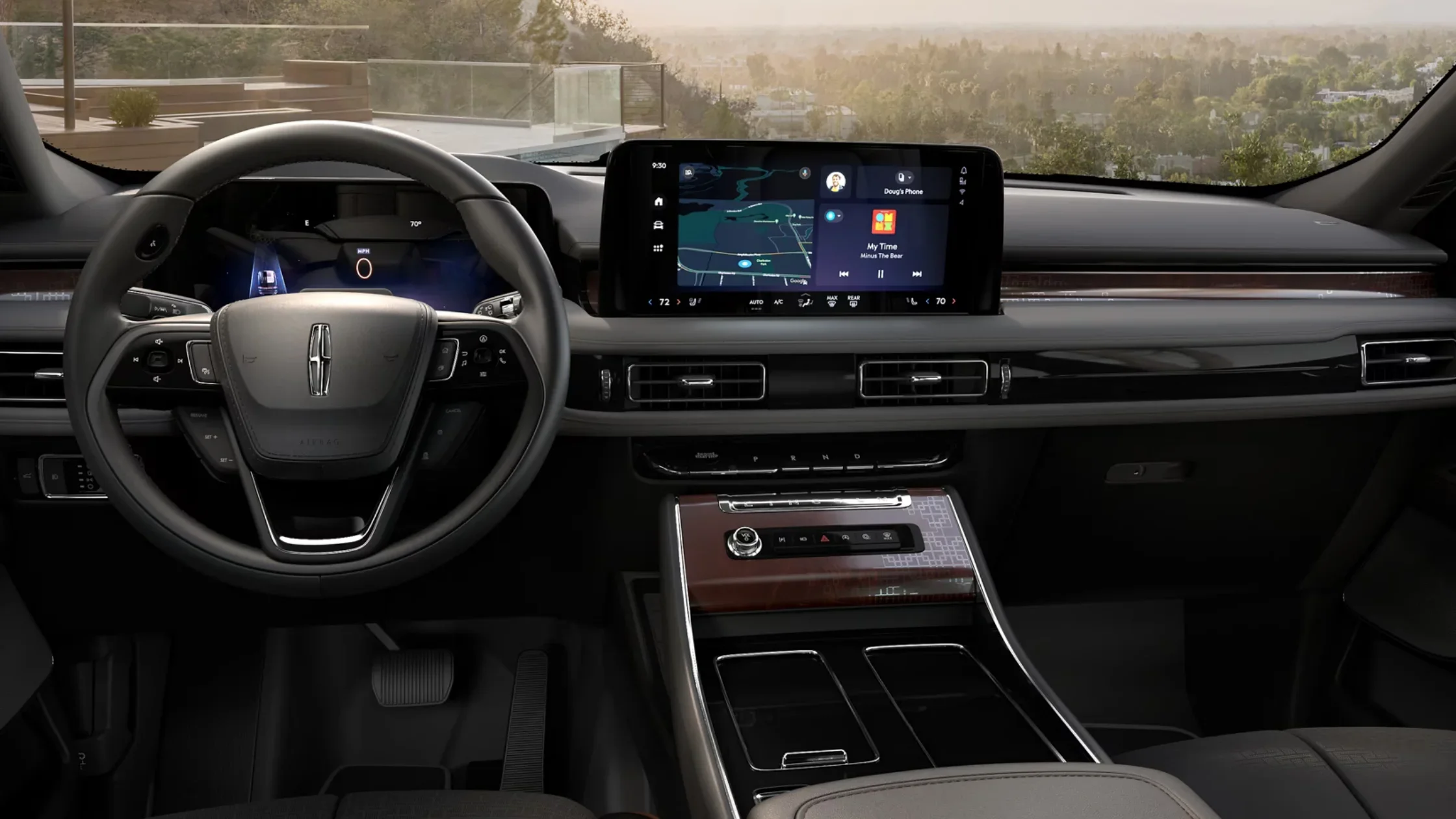 Luxurious interior of the 2025 Lincoln Black Label Aviator featuring touchscreen infotainment and wood accents.
