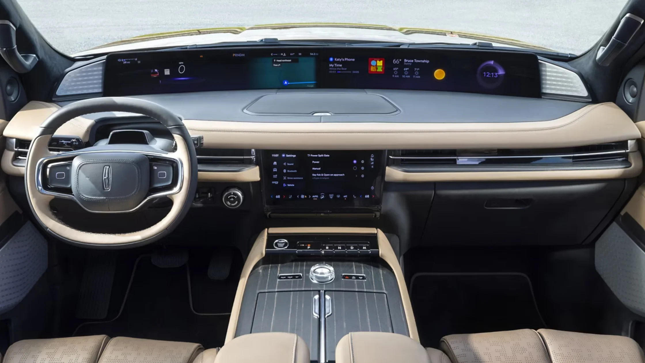 2025 Black Label Navigator® center console with crystal gear selector and woodgrain trim details.