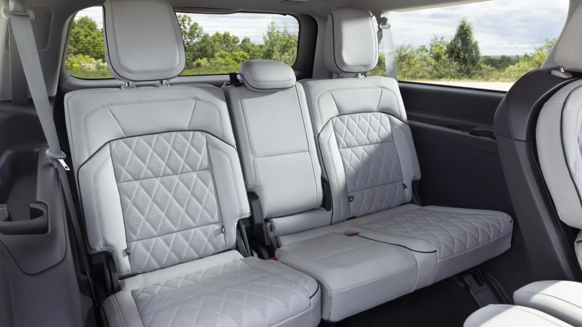 2025 Navigator Reserve rear seats in quilted leather offering comfort and spacious design.